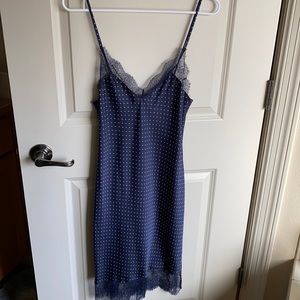 Victoria’s Secret navy polka dot slip nightgown with lace detail.